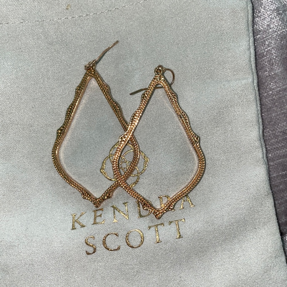 ks gold detailed hanging hoops in teardrop shape